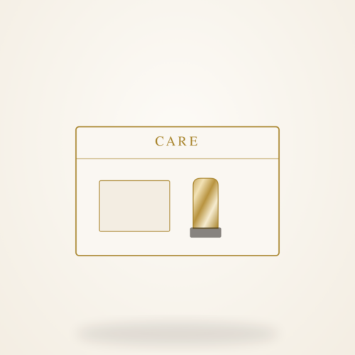 A boxed jewellery care kit containing a polishing cloth, brush and cleaning solution